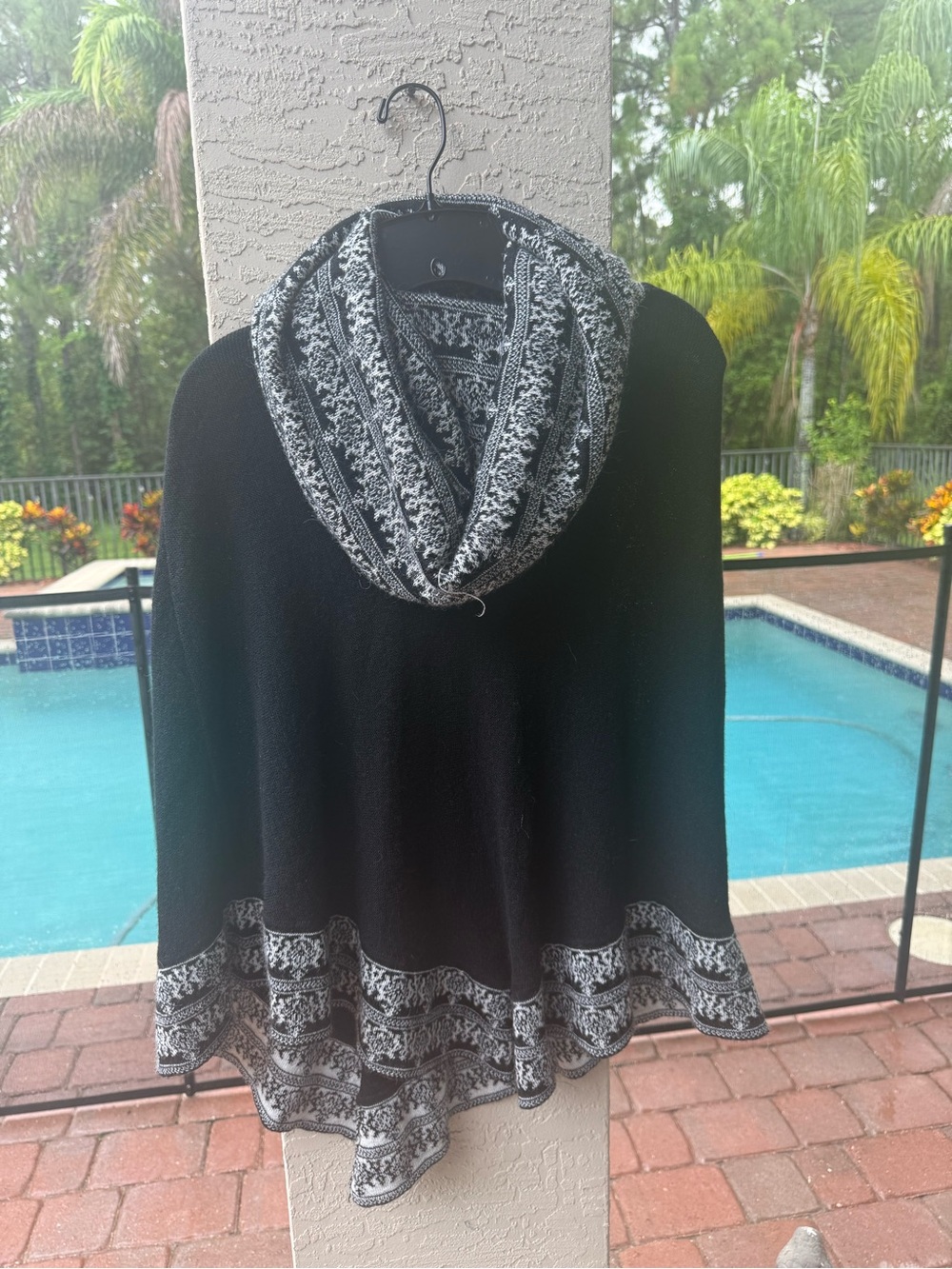 Black Hooded Poncho with Patterned Hem and Trim